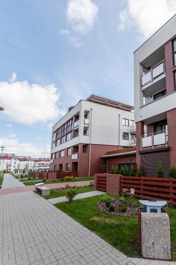 Апартаменты Apartamenty Sun & Snow Kołobrzeg Jantar Колобжег