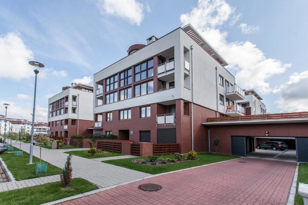 Апартаменты Apartamenty Sun & Snow Kołobrzeg Jantar Колобжег